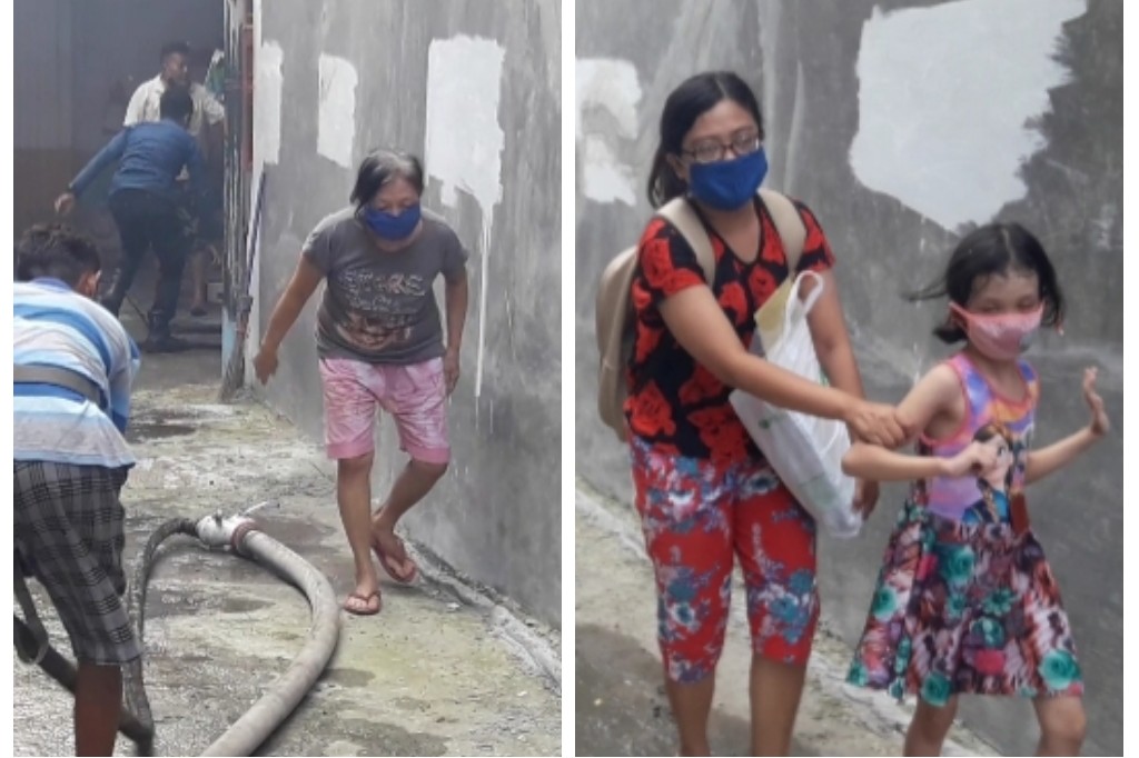 Warga dan salah satu pemilik rumah yang ketakutan dan meninggalkan rumahnya yang spat dijilat api
